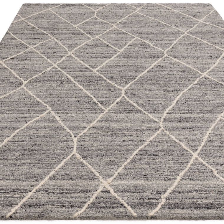 A cotton and latex backing — Berber Wool Living Room Rug — Hand Tufted, Boho, Noah