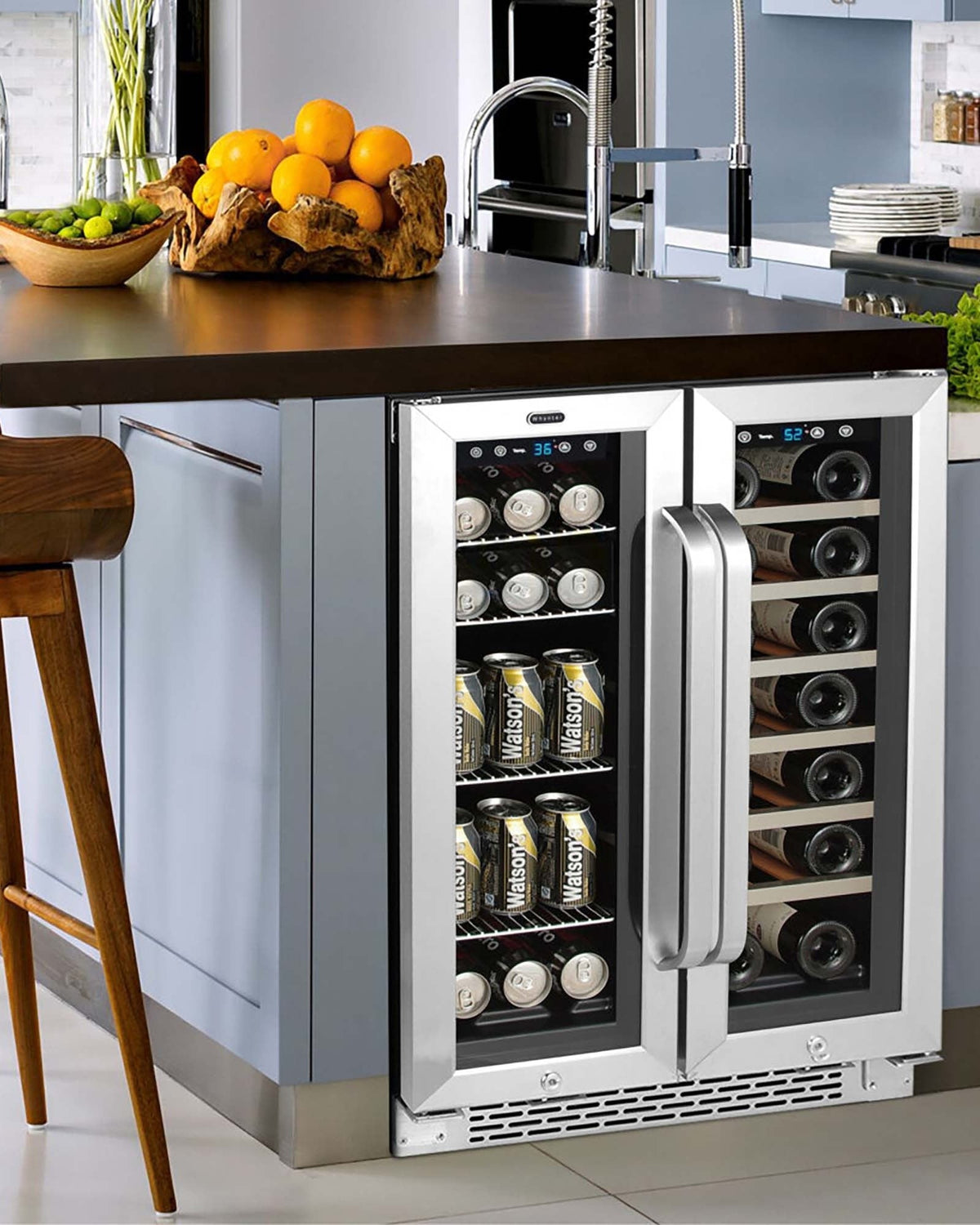 A dual door beverage and wine cooler built in beneath a walnut kitchen counter