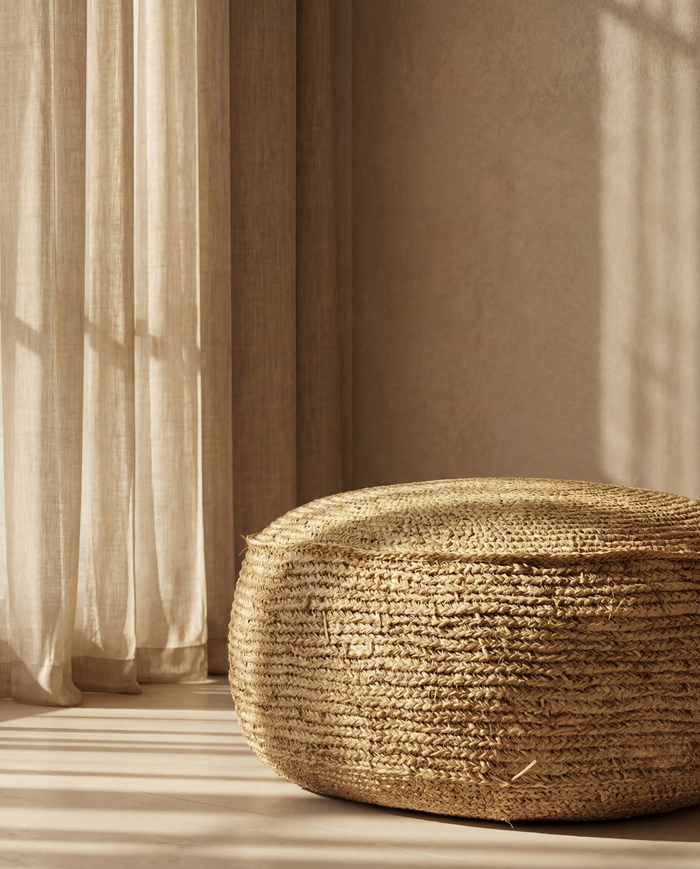 The Raffia Flores Pouffe