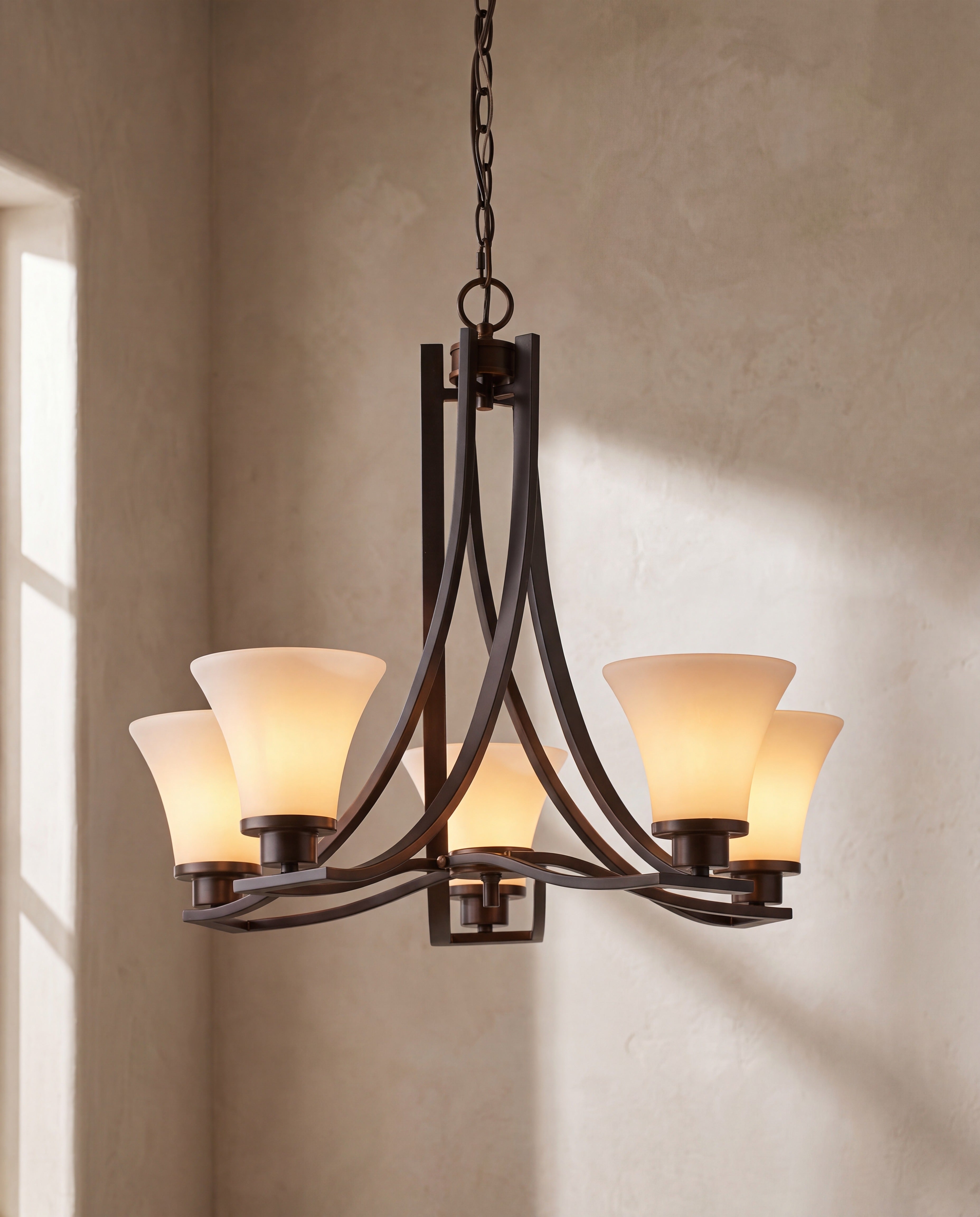 Bronze Five-Light Chandelier with White Shades — illuminated, warm glow