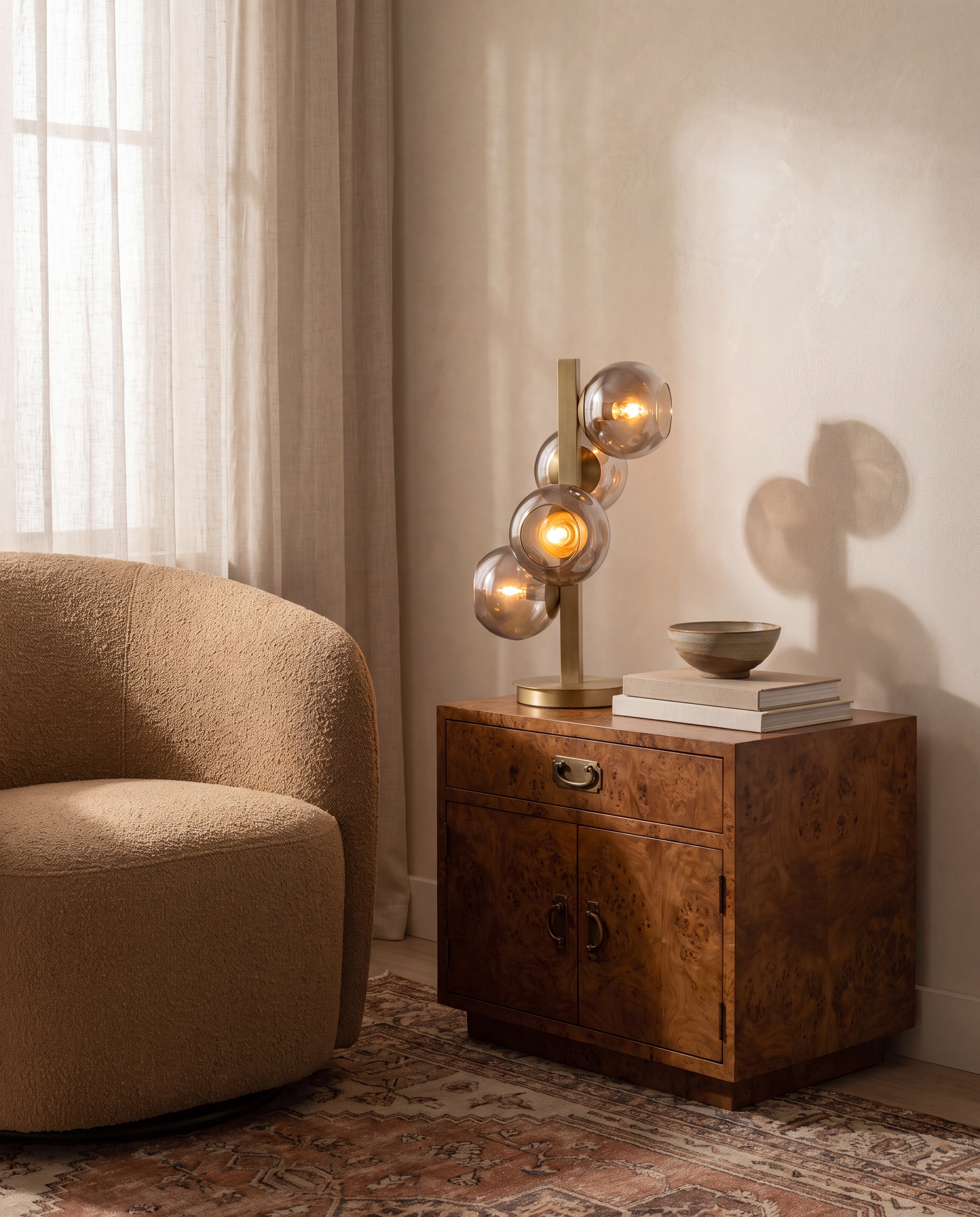 Brass Four-Light Table Lamp with Silver Globe Shades — styled in a warm interior