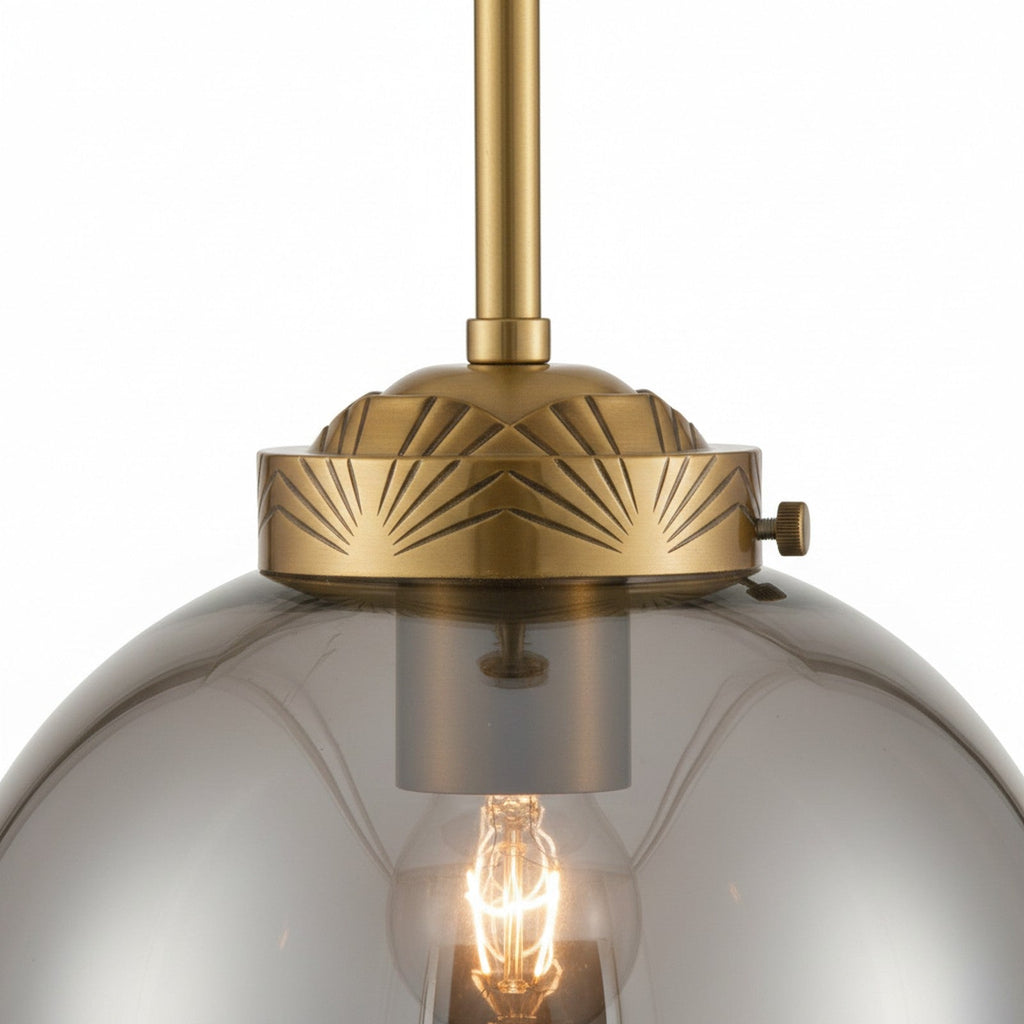 Art Deco Brass Pendant - close-up of brass collar and art deco geometric hardware detail