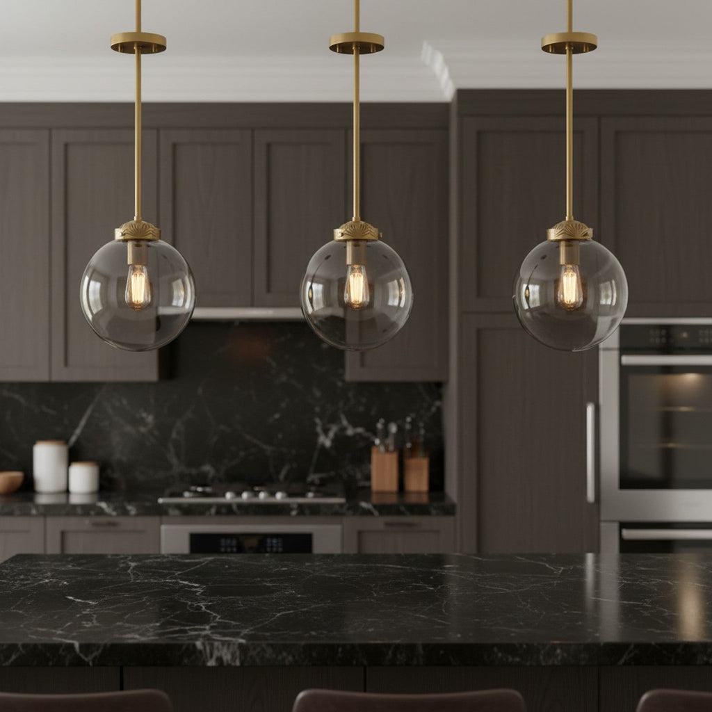 Art Deco Brass Pendant - three pendants in a row above dark marble kitchen counter