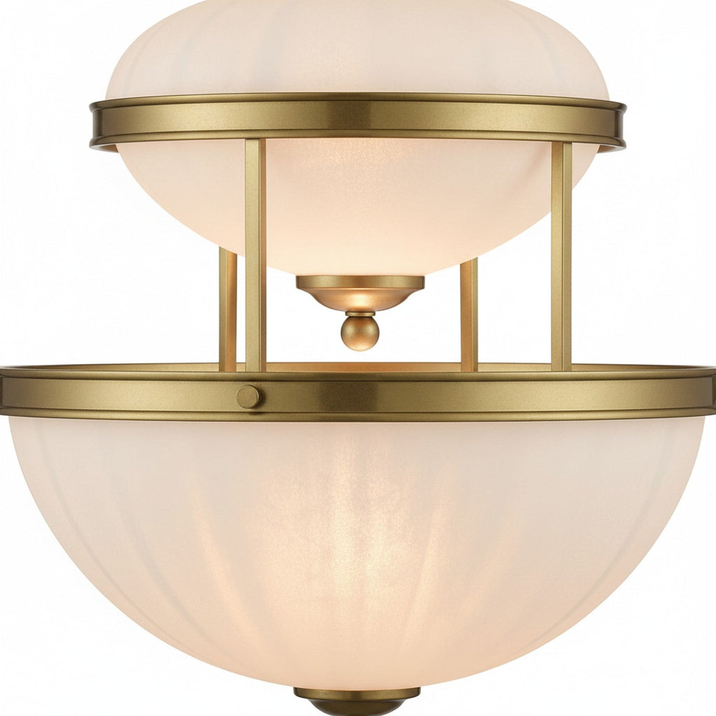 Tiered Brass & Milky Glass Pendant - close-up of opal glass diffusing warm light with brass fitting