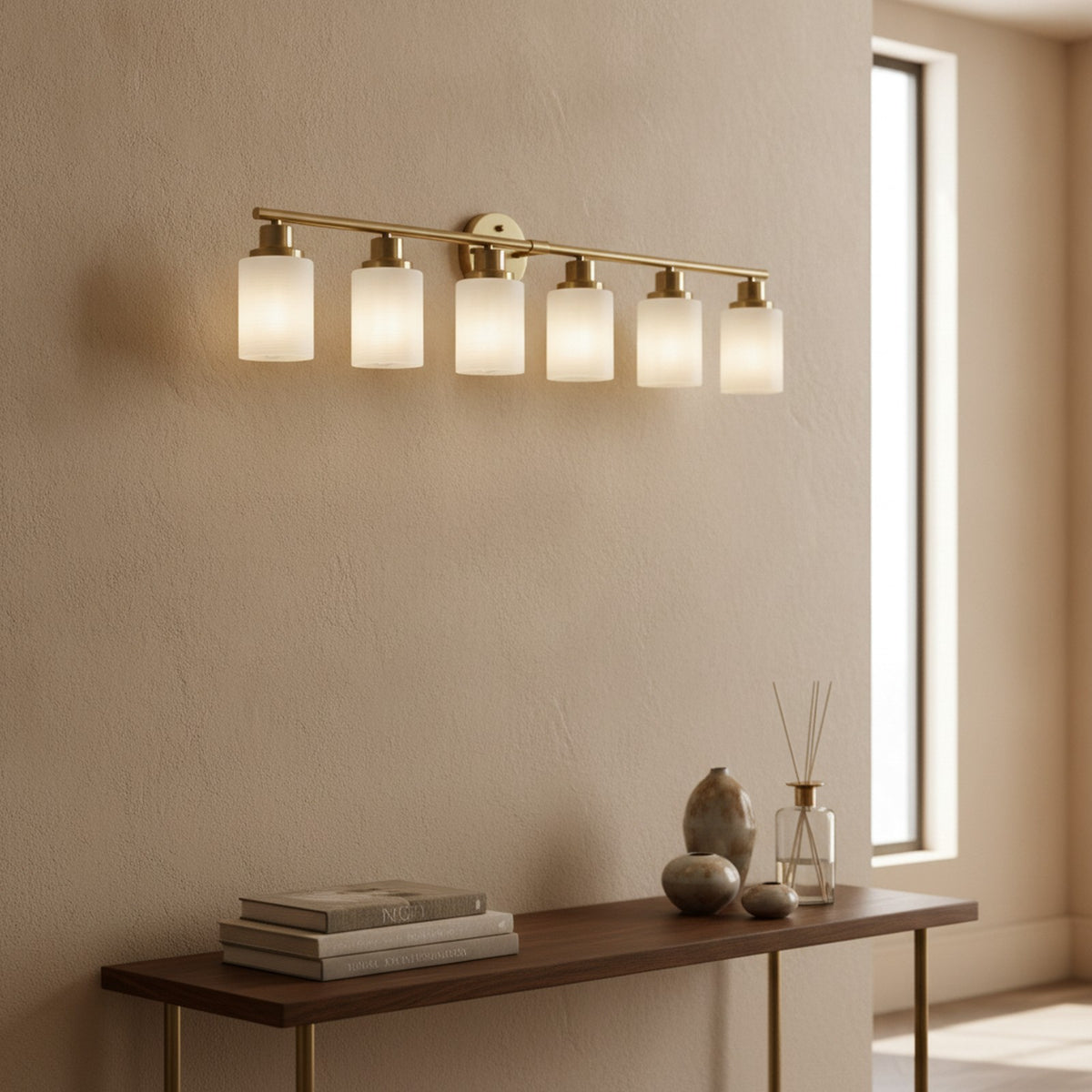 Modern Golden 6-Light Vanity Wall Sconce With Frosted Glass — styled in a Maison Bruxelle interior