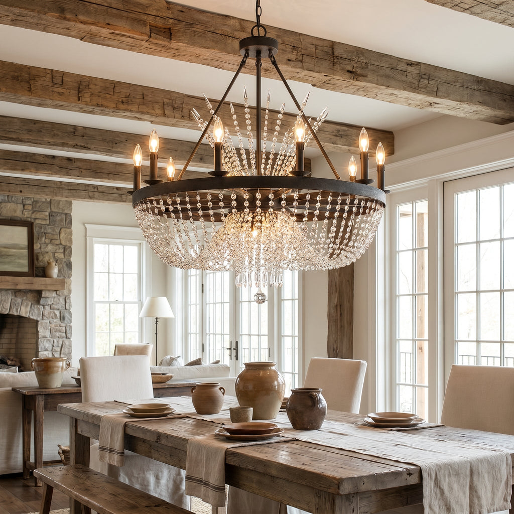 Wagon Wheel Crystal Chandelier in rustic-luxe farmhouse dining room with reclaimed wood beams