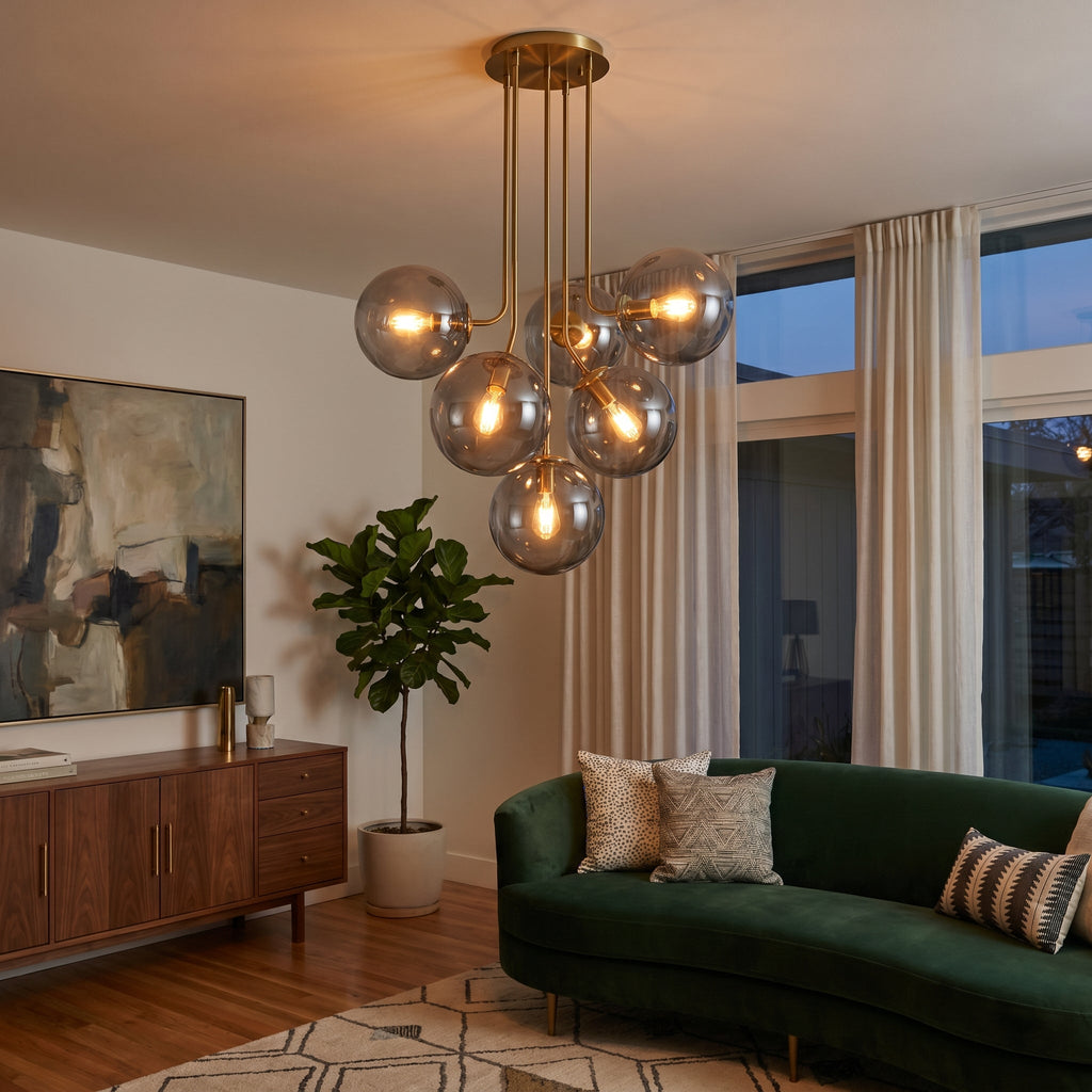 Globe Cluster Chandelier in mid-century modern living room with deep green velvet sofa