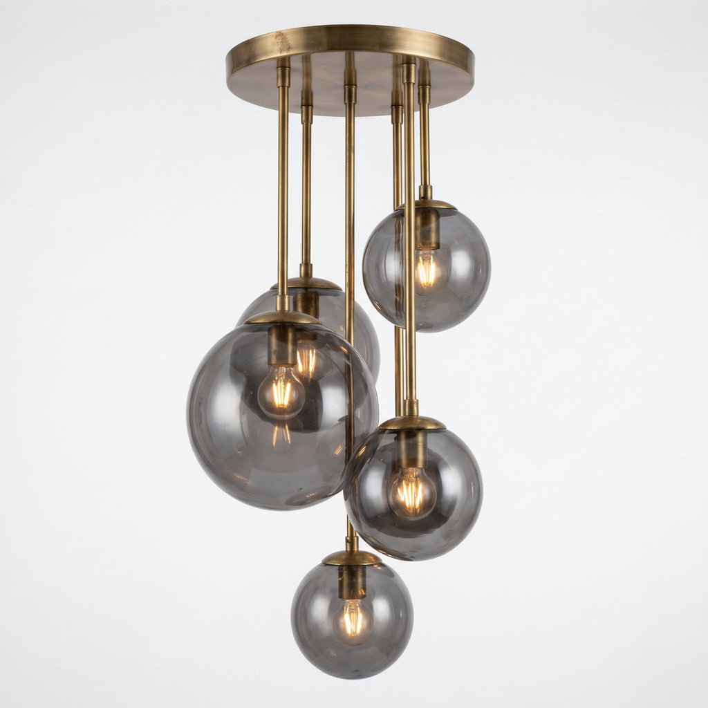Globe Cluster Chandelier from side showing 6 globes at staggered heights on varying brass rods