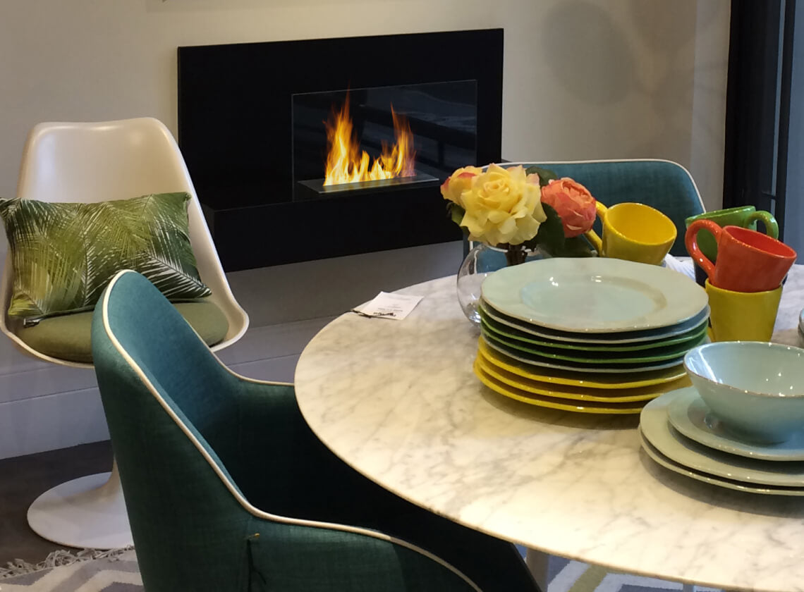 The Bio Flame wall-mounted fireplace installed in a living space