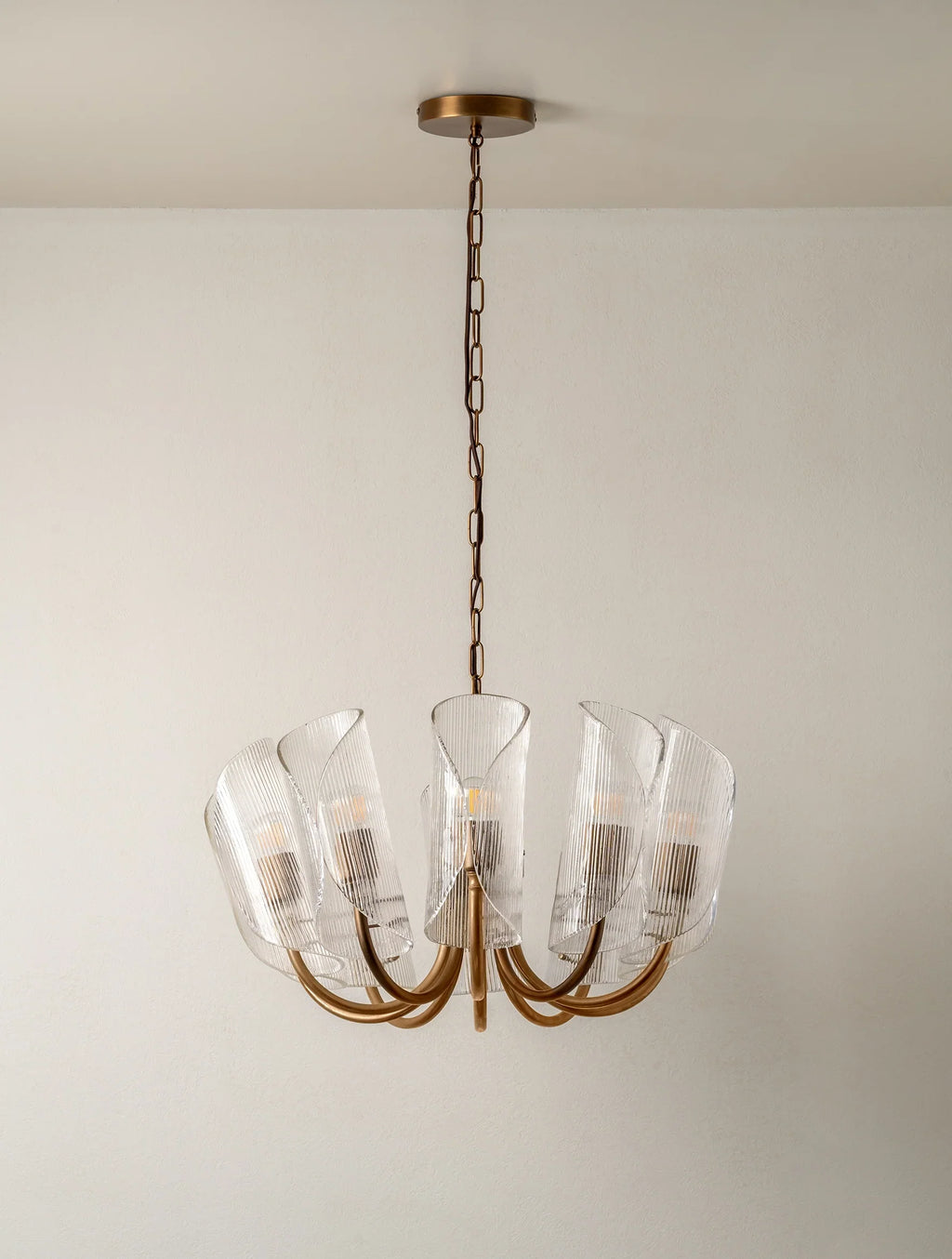 Carnival - 10 Lightweight Chandeliers in Aged Brass and Textured Glass