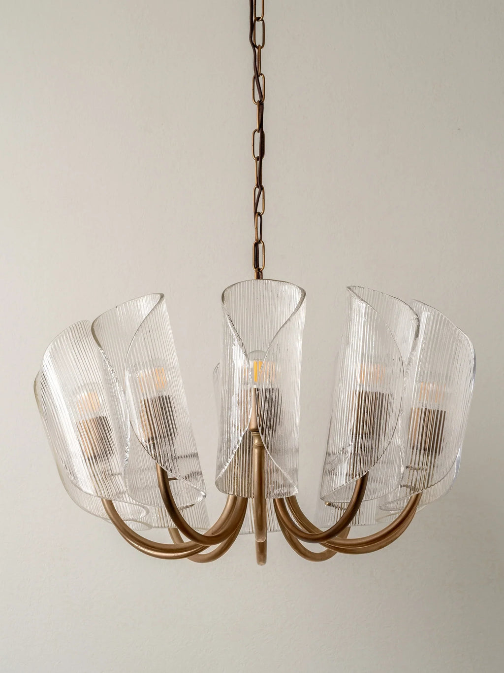 Carnival - 10 Lightweight Chandeliers in Aged Brass and Textured Glass