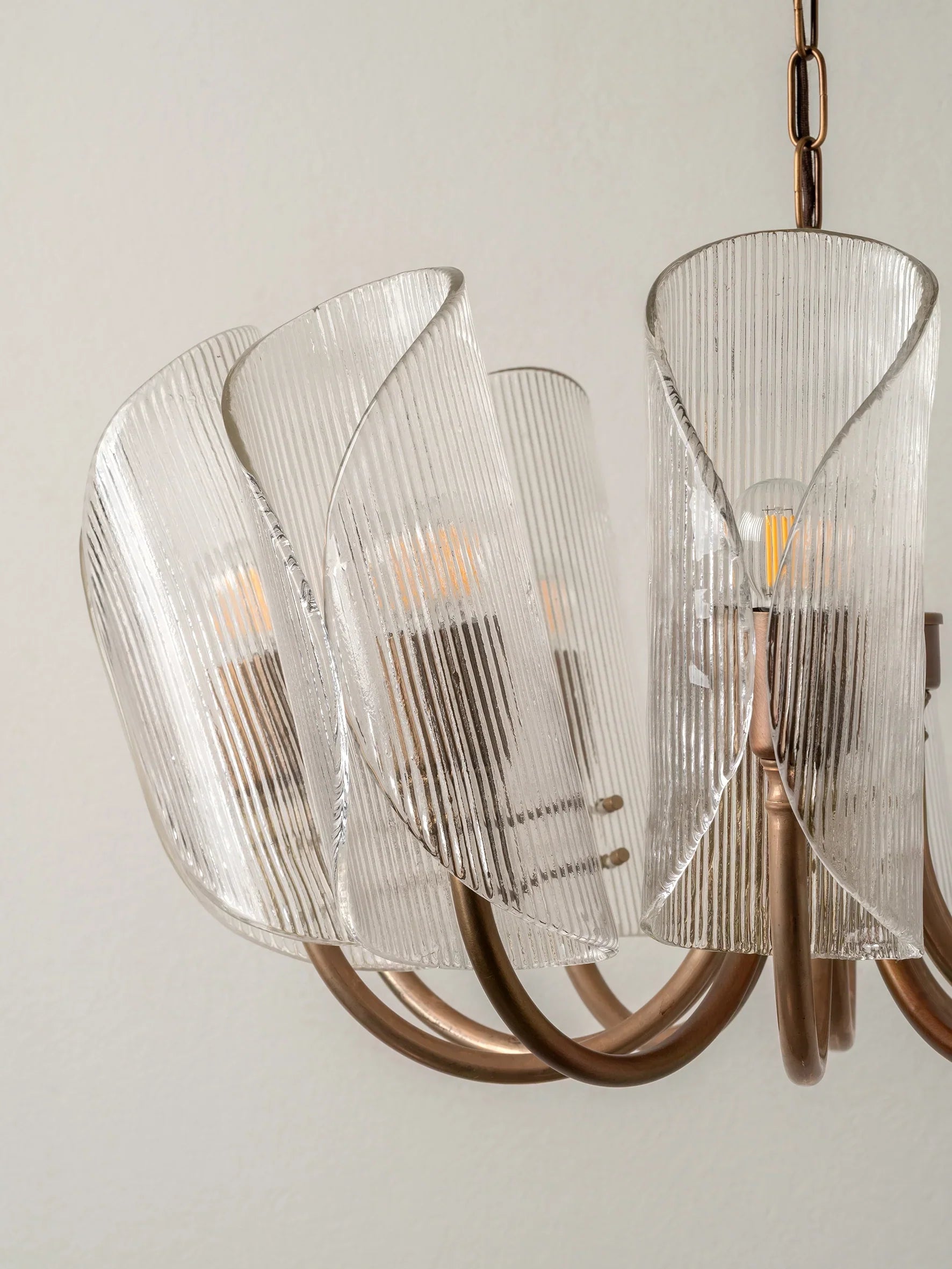 Carnival - 10 Lightweight Chandeliers in Aged Brass and Textured Glass