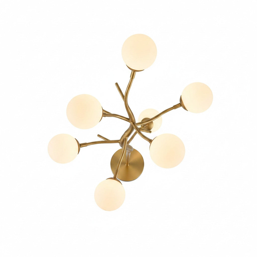 Gold sculptural branch floor lamp top-down view showing radial branch pattern