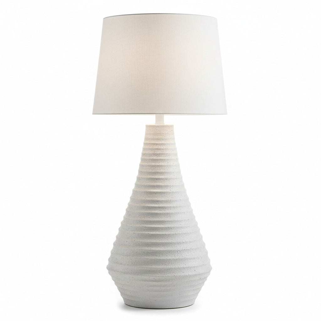 White ceramic textured table lamp side profile showing full height and tapered proportions