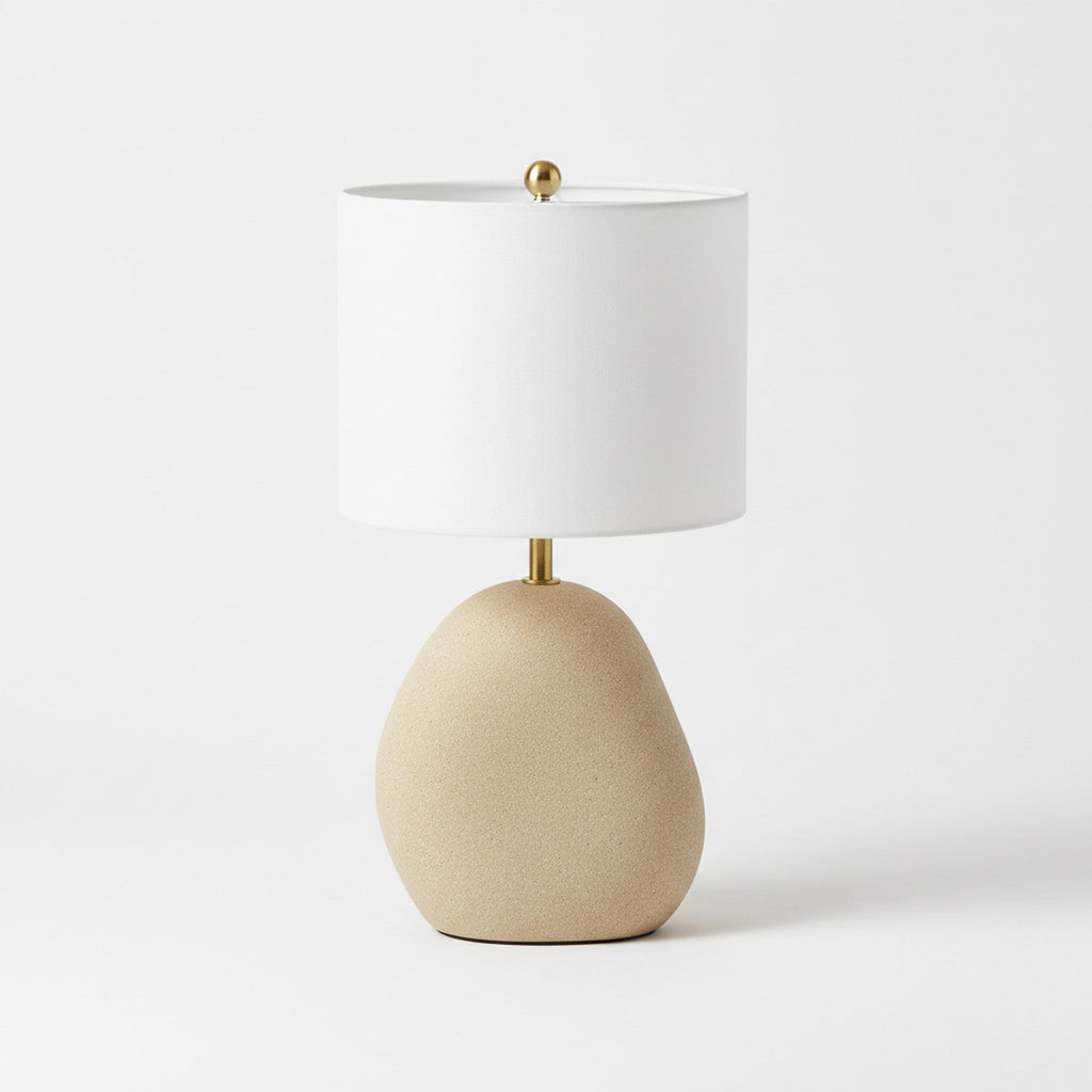 Cast stone sculptural table lamp top-down view showing organic non-cylindrical base shape