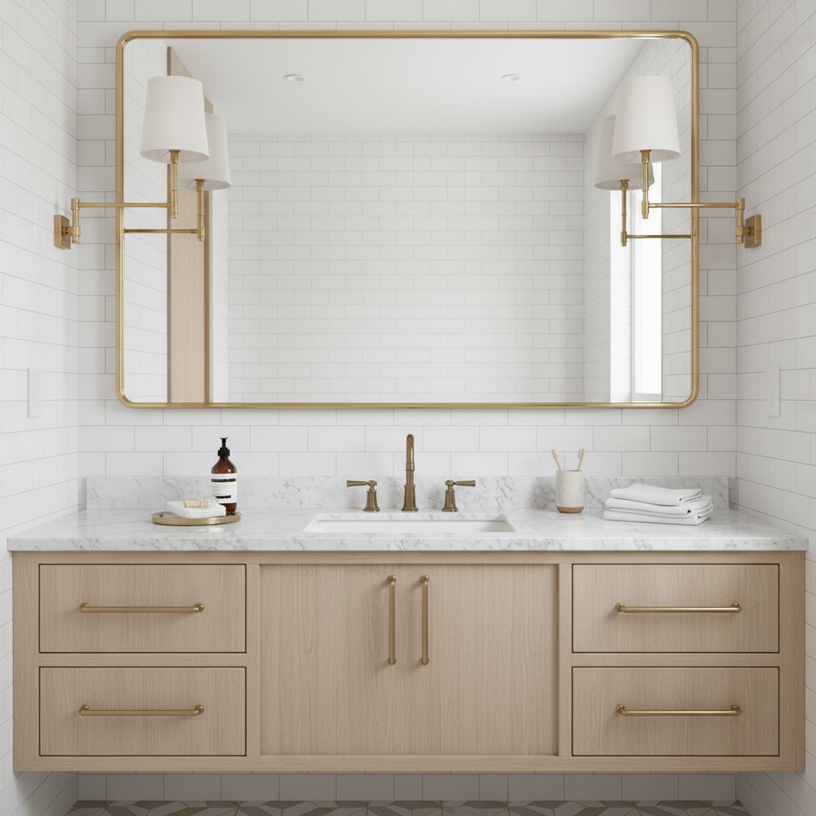 Brass swing-arm sconces flanking bathroom vanity mirror for flattering grooming light