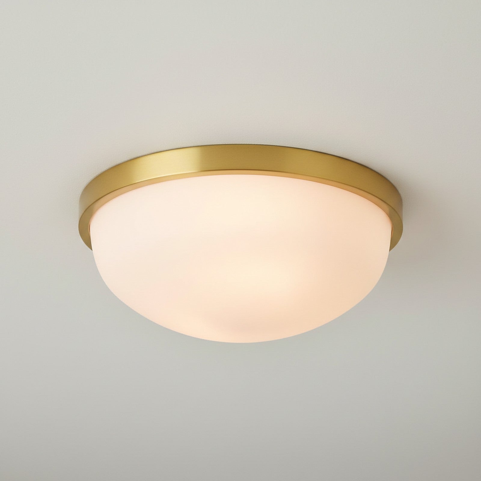 Flush mount ceiling light with brass rim and opal glass dome shade 18 inches diameter