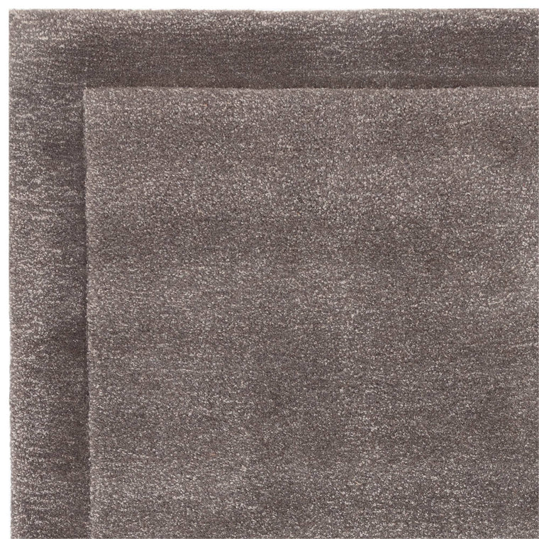 A cotton and latex backing — Wool Living Room Rug — Hand Tufted, Rise